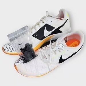 Nike White and Black Running Shoes with Orange Accents
